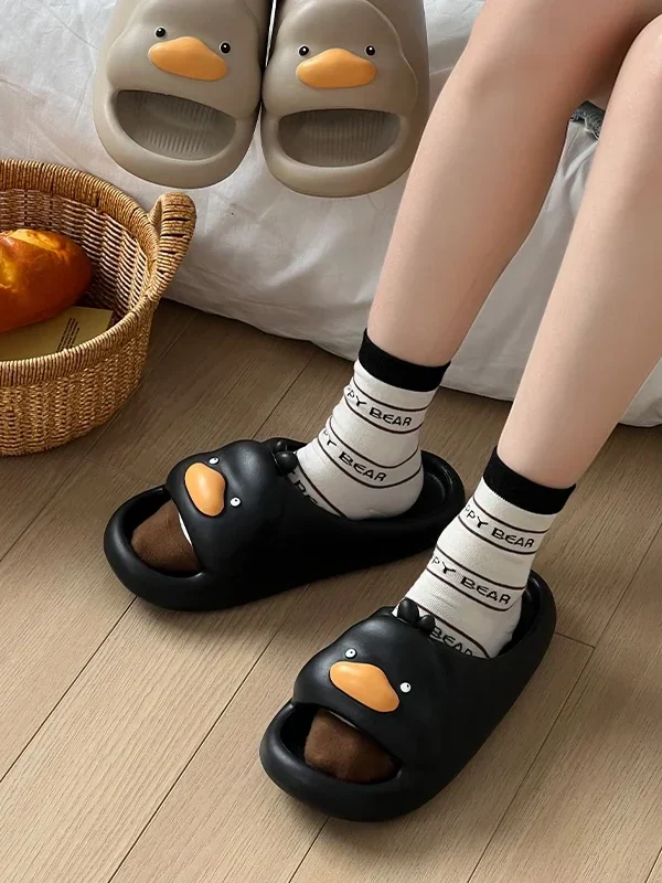 Claquettes canard noir animaux